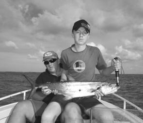 Daniel and Steve Magna with a good-sized mackerel from the Burnett River.